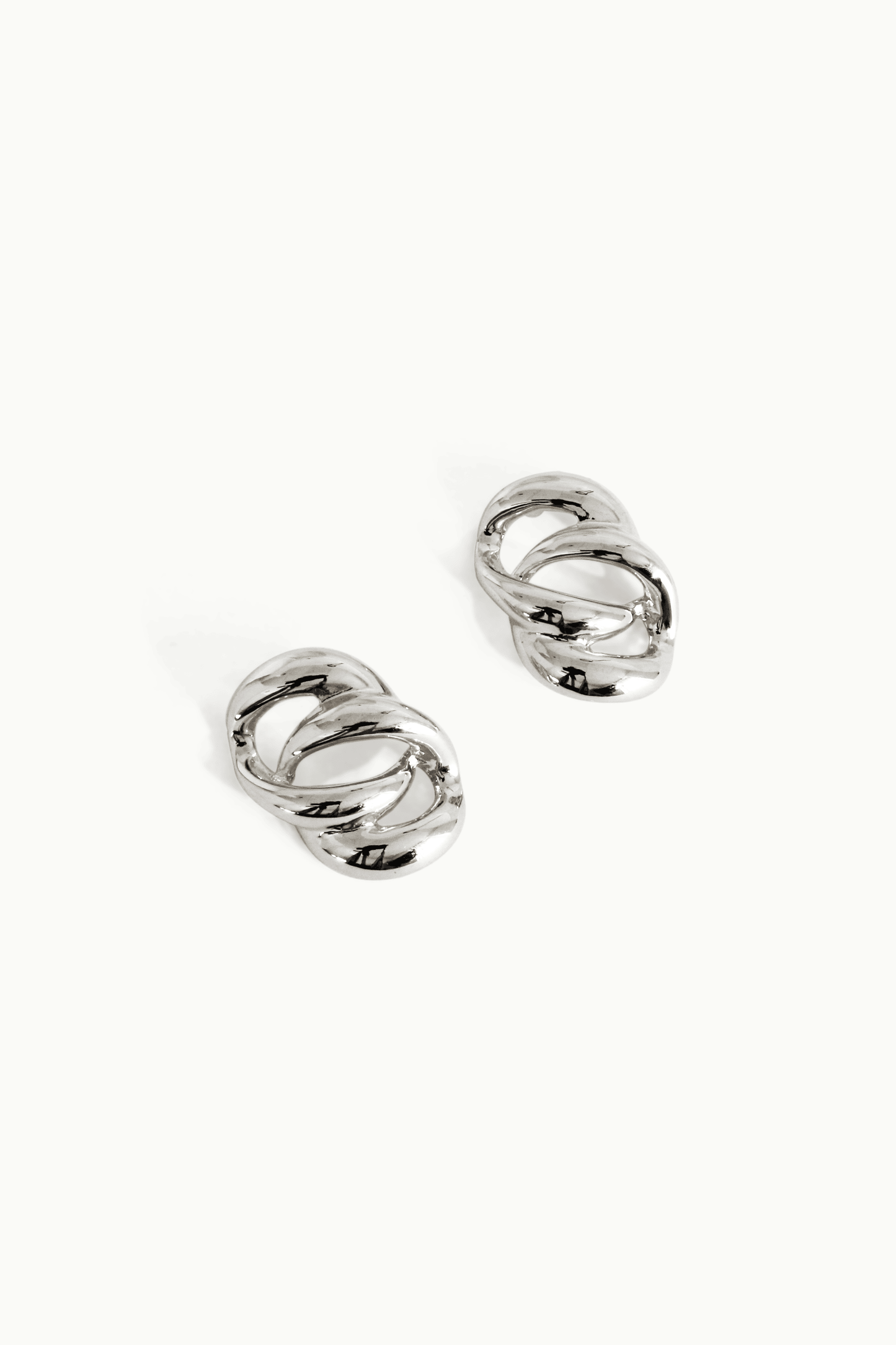 BOUCLES D’OREILLES ENTRELACÉES intercciato